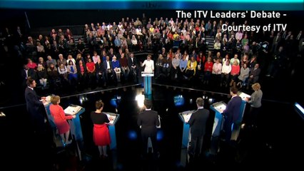 David Cameron heckled during TV debate