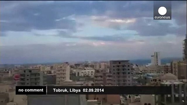 Warplane crashes into building in Libya killing three - no comment