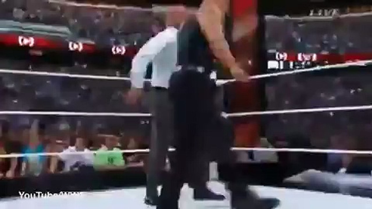 UFC Star Ronda Rousey body Slams Triple H at Wrestlemania 31