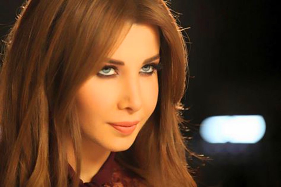 W Bkoun Jayi Wadeaak Official - Nancy Ajram