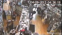 CCTV captures shot shop owner scaring off gunman