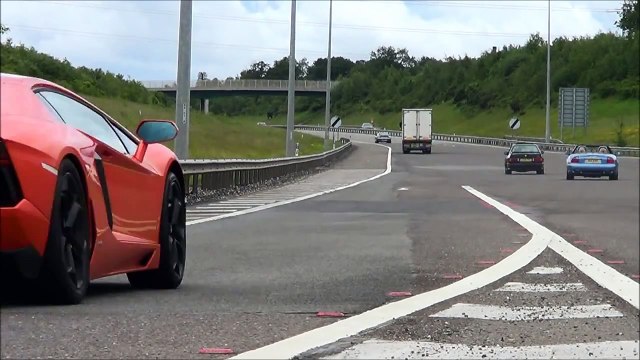 50 Supercars acclerating M6 Toll Supercar Charity Event Toll Plaza Accelerations