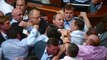 politicians FIGHT in Ukrainian halls of Parliament
