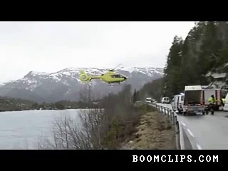 helicopter balances on road rail