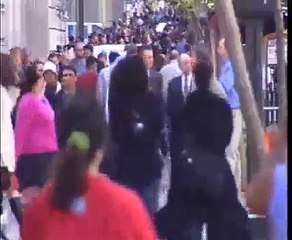 People walking on a busy San Francisco street
