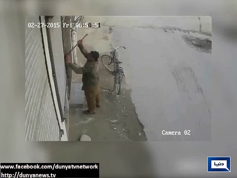Robbery in shop filmed by CCTV camera
