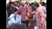 MQM Worker abusing Altaf Hussain Mistakely1