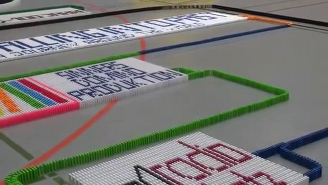 128,000 Dominoes Falling into past a journey around the world 2 Guinness World Records