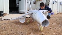 This Syrian Toymaker Makes Toys Out Of Trash For Syrian Children
