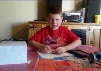 Boy Braves a Bite of Sushi for $10 Bet