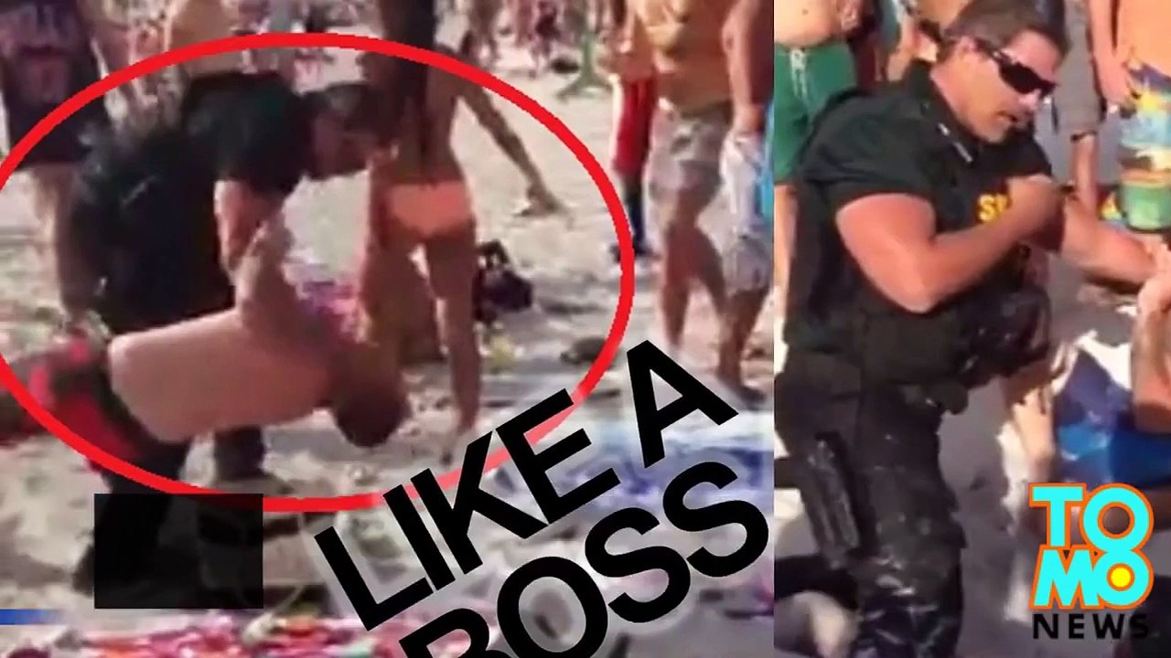 الشرطي برايان برينغهام يعتثقل سكيران على شاطئ فلوريدا