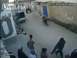 LiveLeak - CCTV footage of lucky man who escaped from 10 rifle rounds