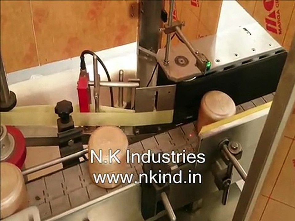 Close view of Sticker Labeling Machine while in operation
