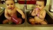 Twin babies having bath time in the sink! SO ADORABLE!