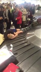 A Guy On baggage belt Airport Domodedovo Russia