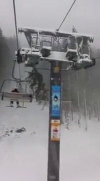 Scary footage of a Tree falling on chairlift - filmed by a skier on the chairlift