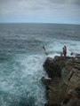 Daredevil Cliff-Jumper Escapes From Dangerous Waves