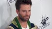 Adam Levine Recalls Getting Rushed on Stage by Female Fan
