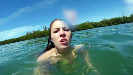 Dumb Girl so scared by a manatee thinks the animal will attack her!