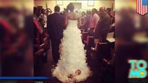 عروس تعلق وليدتها الجديدة في ذيل فستان زفافها