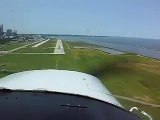 Full Stop Landing Runway 24R Burke Lakefront Cessna 152 T