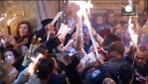 Thousands gather at the Holy Sepulchre in Jerusalem for the start of Orthodox Easter