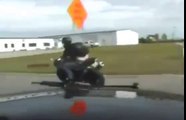 DashCam: See Ya!! Police chase fleeing motorcycle at high speeds, jump railroad tracks...