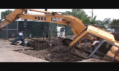Excavator pulled out of mud