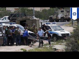 下载视频: Palestinian stabs two Israeli soldiers in the West Bank before one shoots him dead