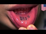 ISIS lip tattoo: Home Depot employee fired after showing off inner-lip tat with ex's name