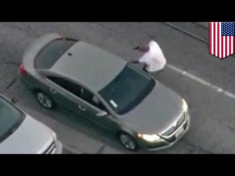 Real life GTA: A high speed pursuit caught on live TV ends with LAPD shooting a crazed gunman