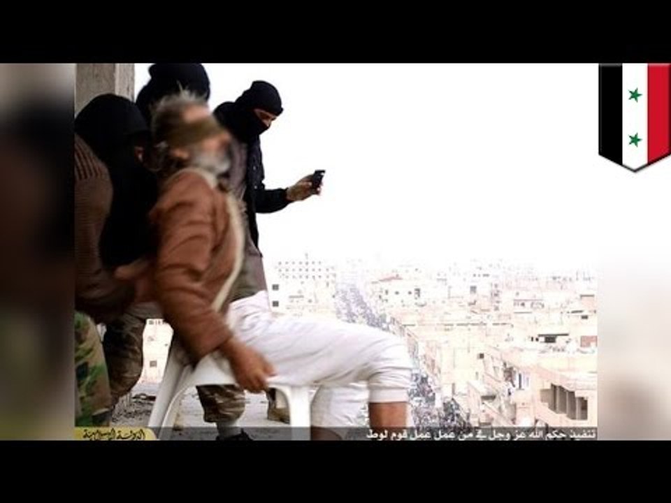 ISIS throw man off building for being gay, crowd stones him to death - video Dailymotion