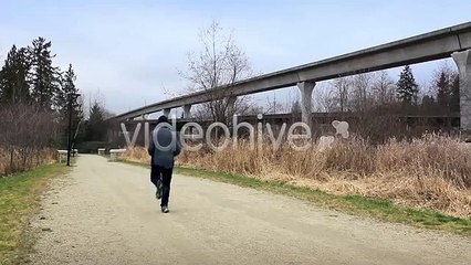 $10 STOCK - Man Runs In Urban Area -  (2 Clips)