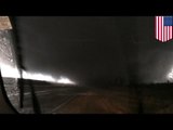 Tornado video: Illinois man sits in car while filming tornado passing just feet away