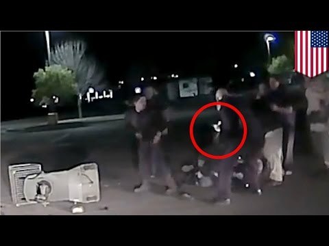 Walmart brawl shooting: dashcam footage shows moment cop shoots Christian band member