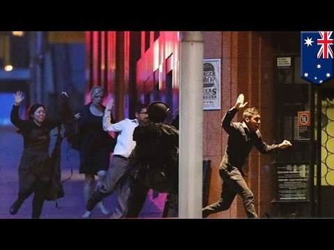 Sydney cafe siege: 3 dead, including gunman, after police storm besieged Sydney cafe