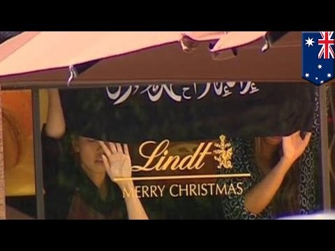 Sydney hostage crisis: Dozens of people held hostage in Lindt Cafe at Martin Place