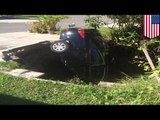 10-foot sinkhole swallows car after opening beneath driveway in Pasco, Florida