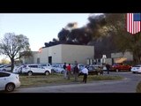 Plane crashed into a building at a Kansas airport, killing four people