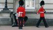 Buckingham Palace guard slips and falls in front of hundreds of tourists