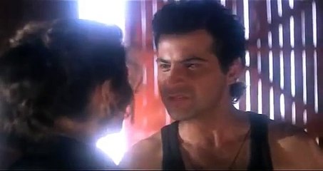 Madhuri Dixit in black bra opens shirt, scene from RAJA