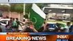 Kashmiris wave Pakistan flags