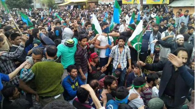 kashmiri waves Pakistani flags