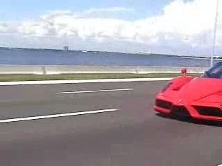 Speeding- Ferrari Enzo and Camaro on hig