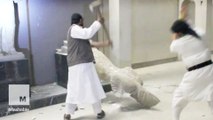 Islamic State release video showing militants destroying centuries-old artifacts in a museum