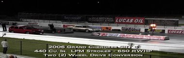 Fastest NA SRT 8 Jeep Cherokee vs Big Block Camaro  - Wheelstand - Drag Race Video -- Road Test TV