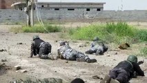 Raw: Iraqi Troops in Gunbattle in Tikrit