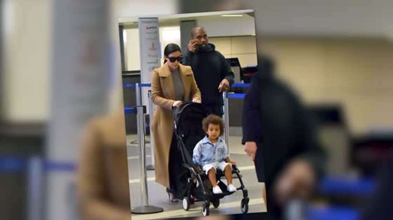 Influential Couple Kim Kardashian And Kanye Wes...