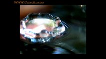 Macro slow motion water drop looking into the splash in UltraSlo