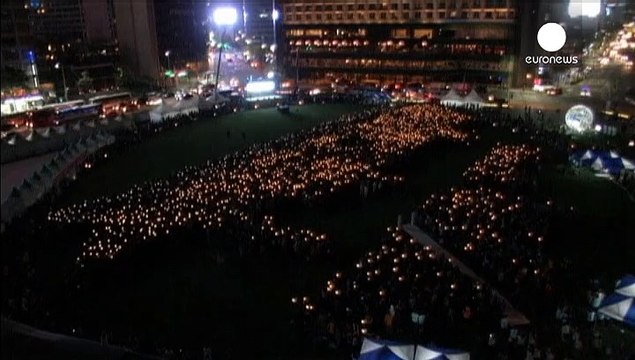 {Watch} Attempt at world's largest candlelit vigil in S Korea